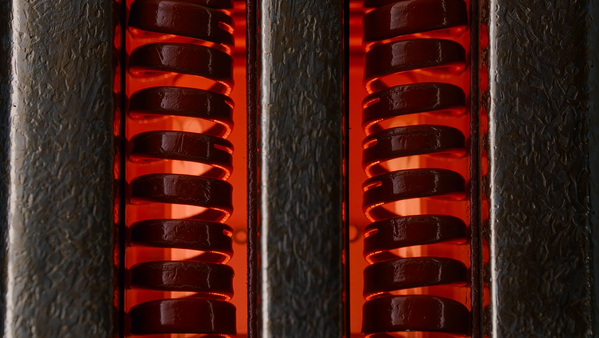 Heating coils glowing red inside the slot